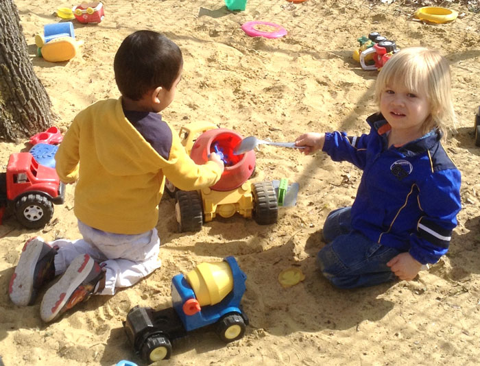 kids playing in the sand at daycare in Concord & Boscawen, NH